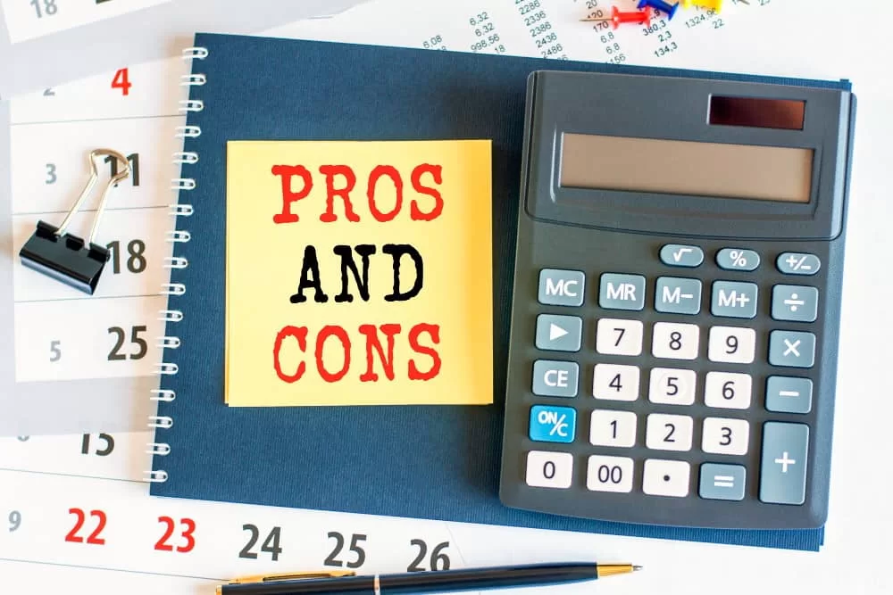 yellow-piece-paper-with-text-pros-cons-calculator