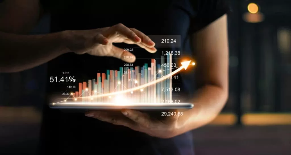 businessman-holding-tablet-showing-growing-virtual-hologram-statistics-graph-chart-with-arrow-up